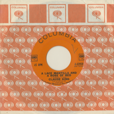 A Lace Mantilla And A Rose Of Red / That's What Makes The World Go Around