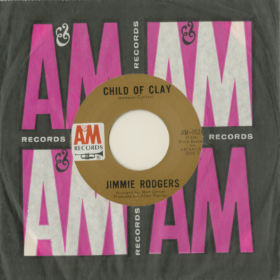 Child Of Clay / What A Strange Town