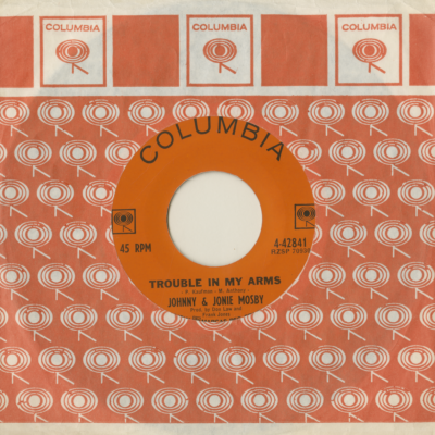 Trouble In My Arms / Cheatin' Who